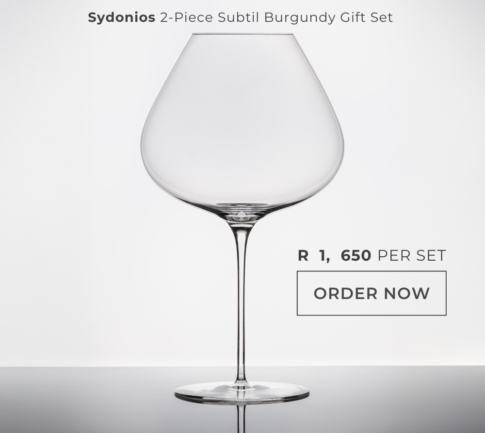 Burgundy wine glass on a white background with text for "Sydonios 2-Piece Set" and a price, prompting to order now.