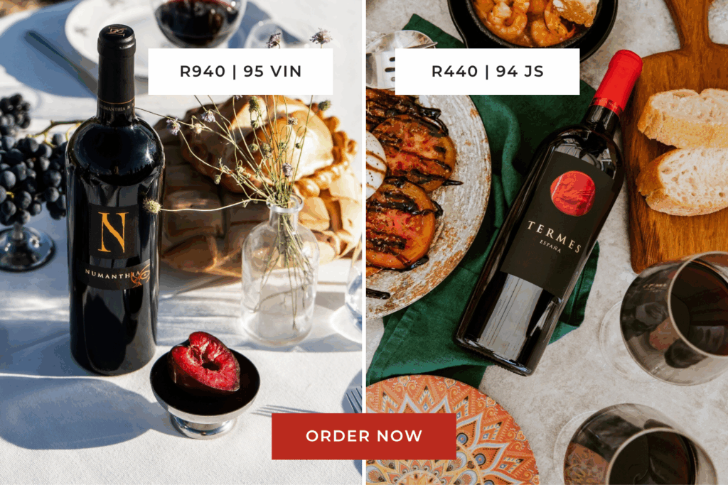Two wine bottles showcased on a table with food and glassware, featuring Numantia and Termes labels, inviting customers to order.