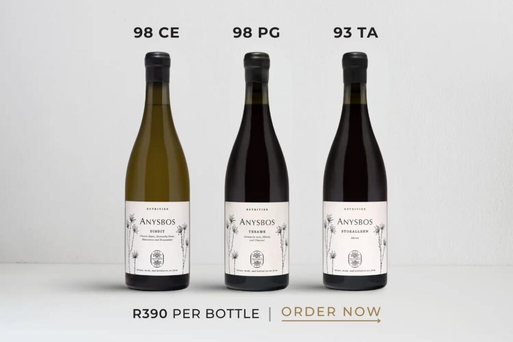 Three bottles of Anysbos wine with ratings above each and price R390 per bottle against a plain background.
