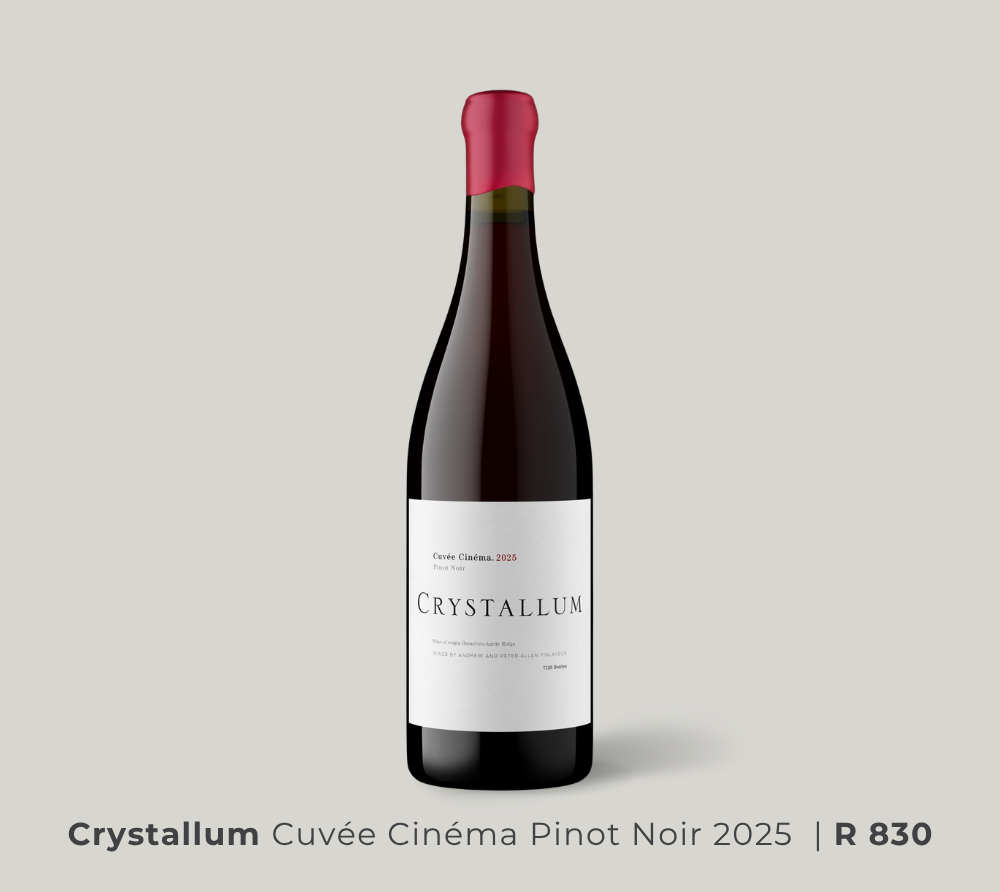 Bottle of Crystallum Cuvée Cinéma Pinot Noir 2025 wine with red wax seal and minimalist white label on neutral background.