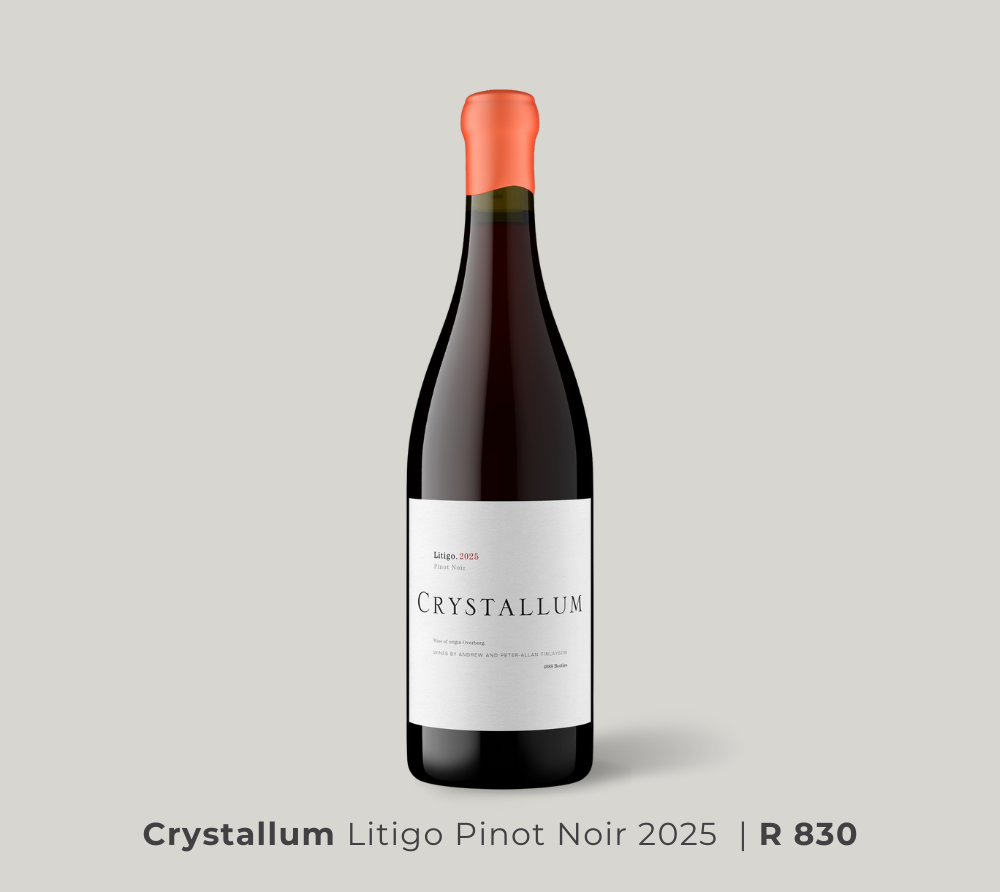 Bottle of Crystallum Litigo Pinot Noir 2025 wine with a white label and orange foil on a light gray background.