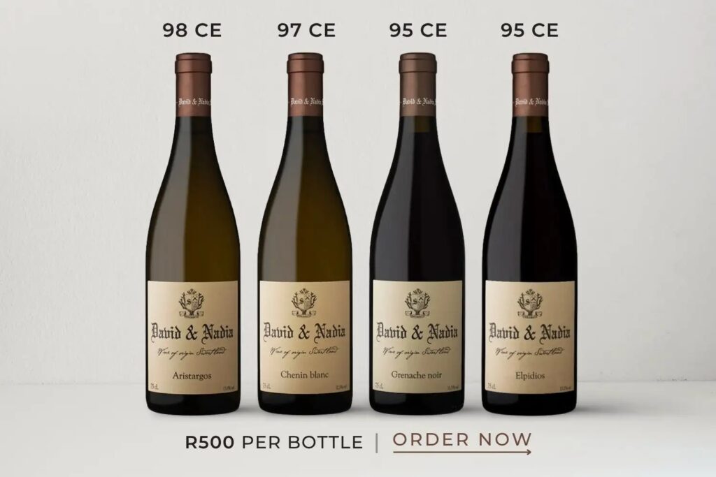 Four bottles of David & Nadia wine labeled Aristargos, Chenin blanc, Grenache noir, and Elpidios priced at R500 each.
