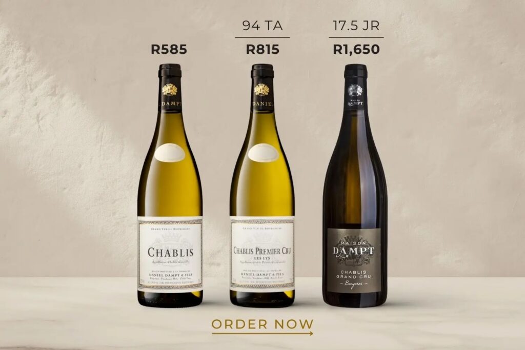 Three Chablis wine bottles—two golden-white wines and a dark sparkling bottle—stand against a cream backdrop, with prices and an “Order Now” prompt.