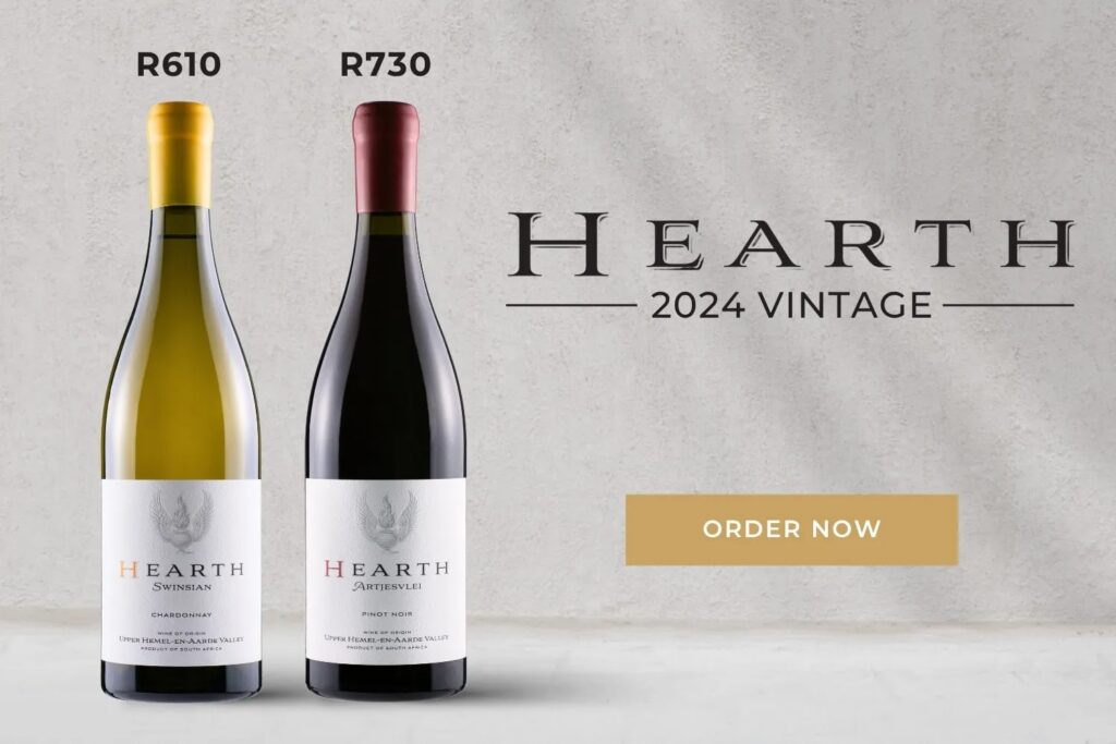 Two Hearth wine bottles, R610 white and R730 red, stand beside “Hearth 2024 Vintage” and a gold “Order Now” button in an elegant, muted ad.